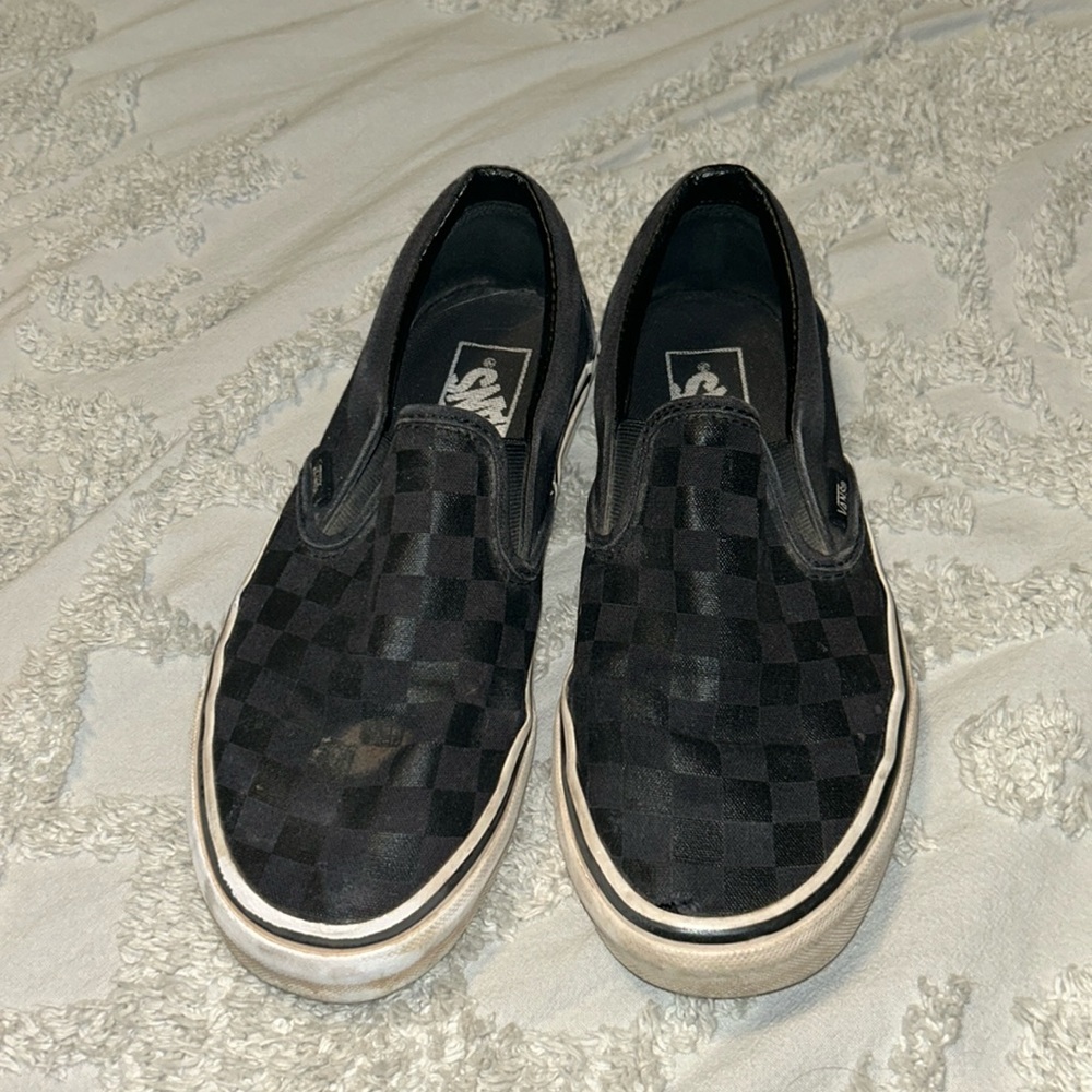 Black in black checkered vans